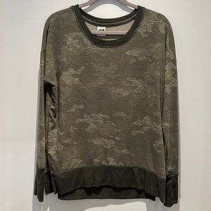 Camouflage green, long sleeve t-shirt, stretchy and soft. Women’s small (4-6).